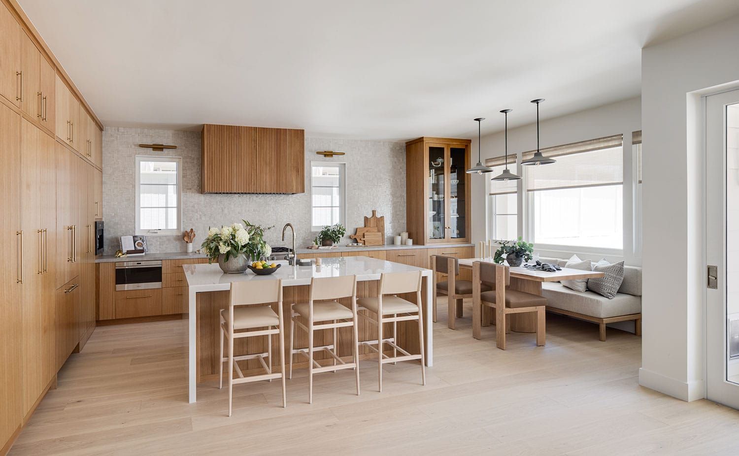 White oak kitchen with banquette seating