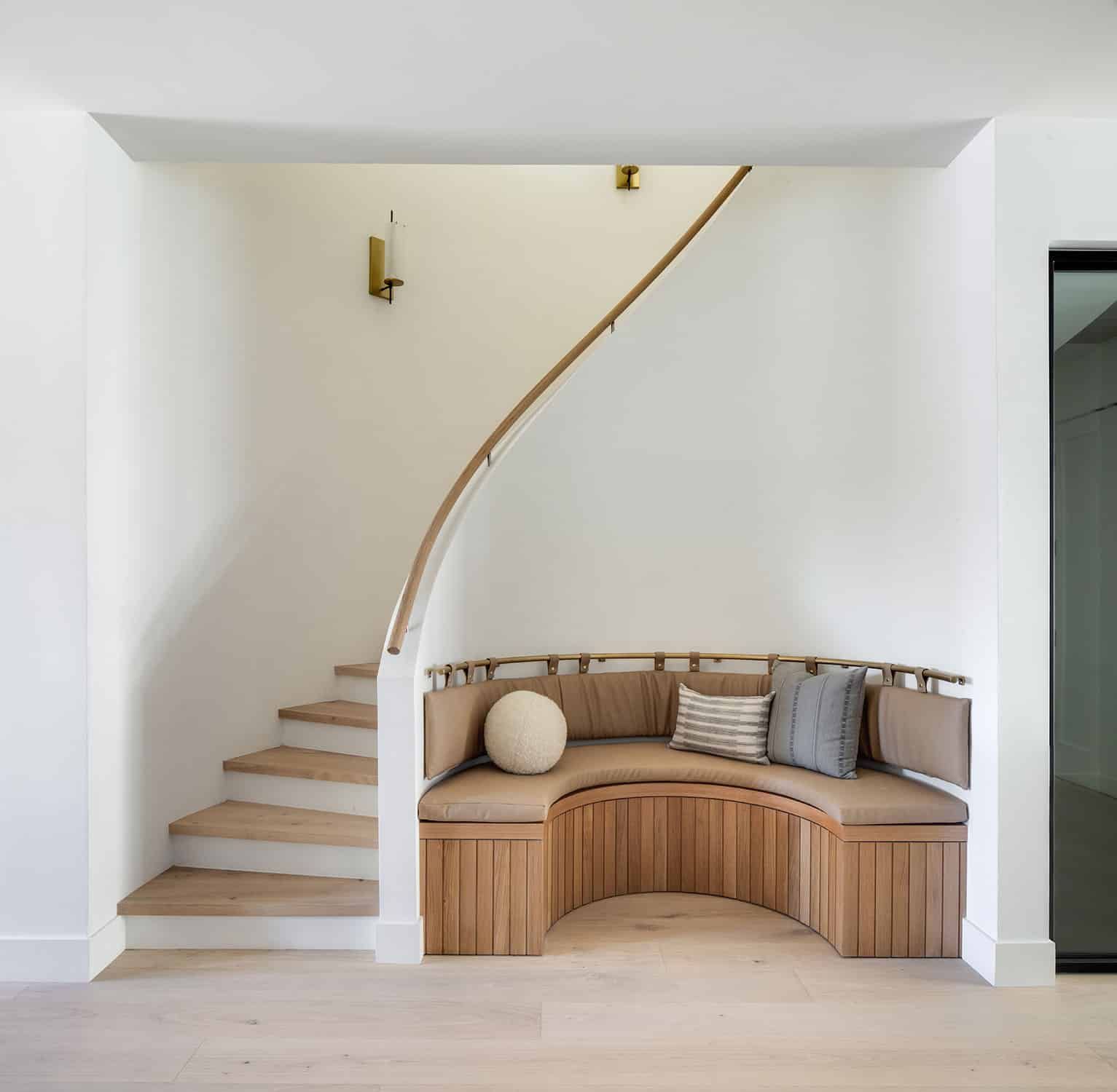 Curved staircase with built-in bench