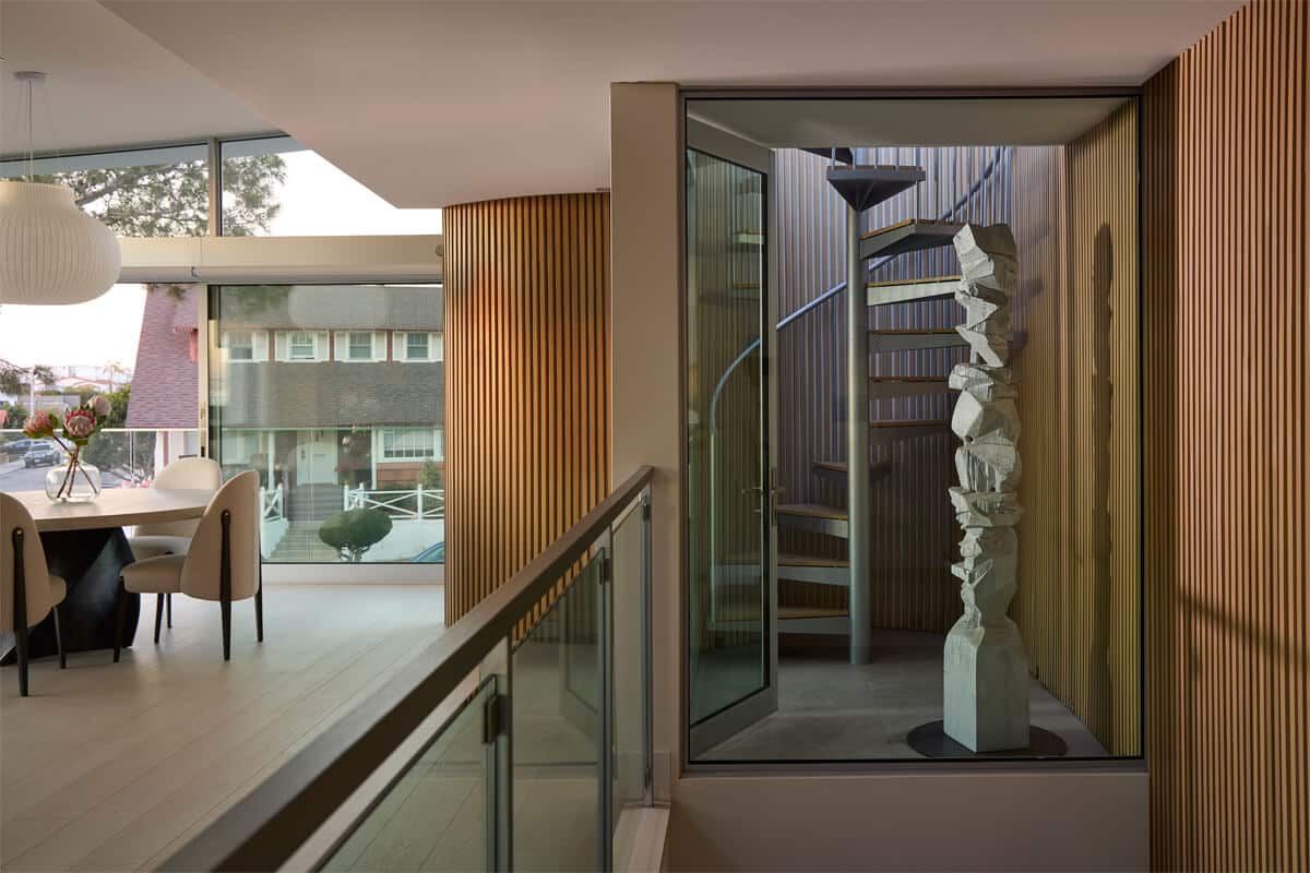 Glass-enclosed spiral staircase