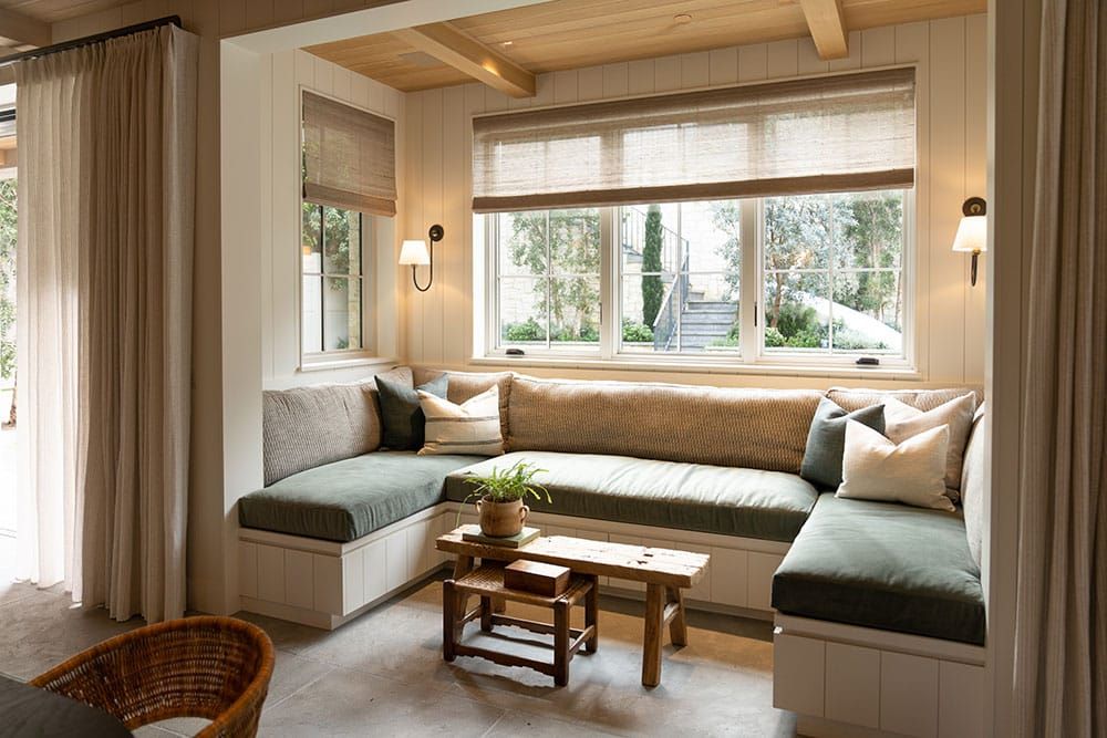 Custom window nook with wood beams in an RJ Smith Construction home