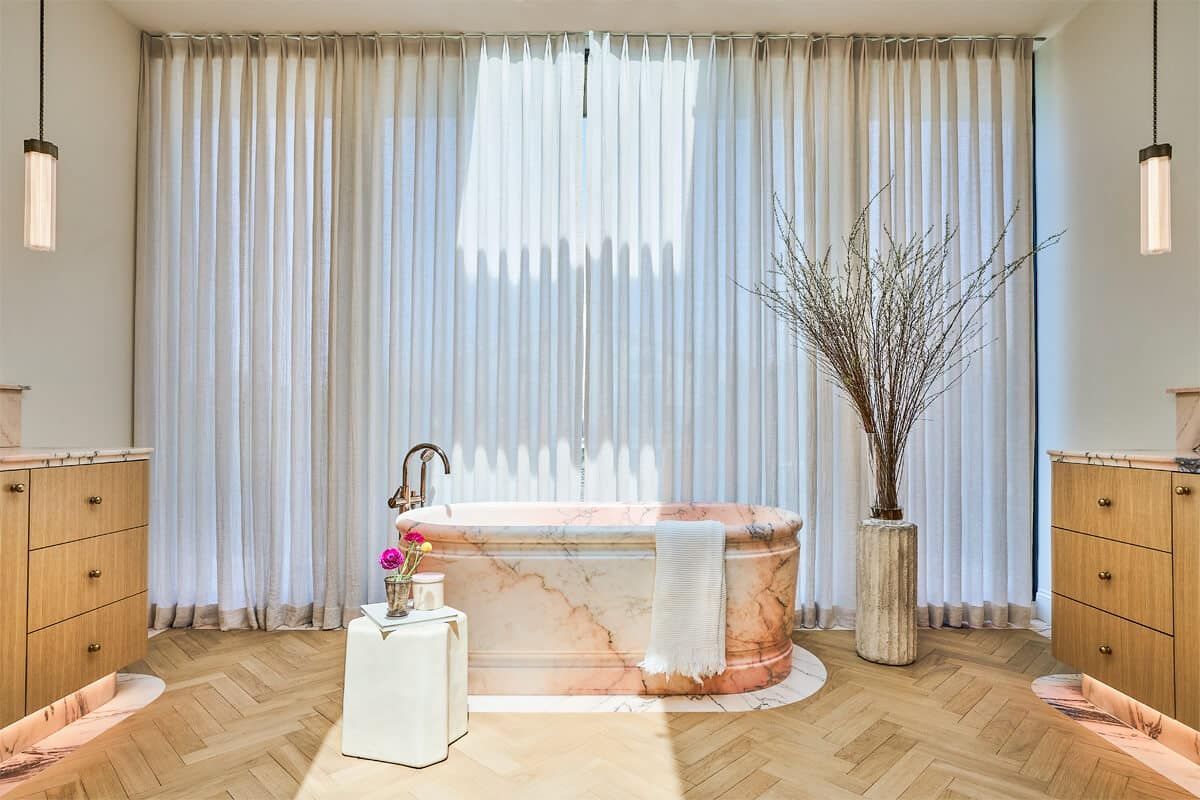 Primary bath with freestanding stone tub